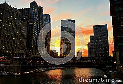 Winter sunset over the Chicago River in the loop during evening commute. Stock Photo