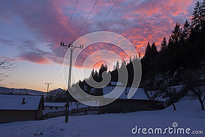 Winter sunset in the village of Petru Voda Stock Photo