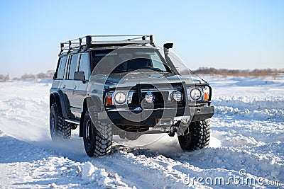 Winter SUV ride Stock Photo