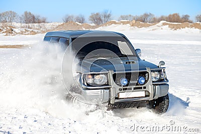 Winter SUV ride Stock Photo