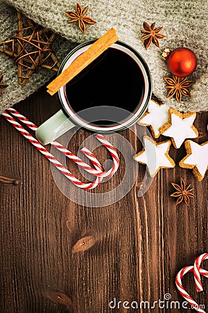 Winter theme. Hot steaming cup of glint wine with spices Stock Photo