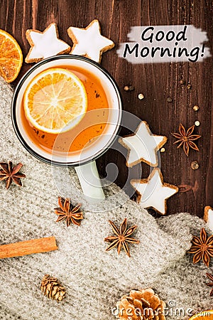Winter theme. Hot tea with spices, orange,cinnamon,anise,cookies Stock Photo