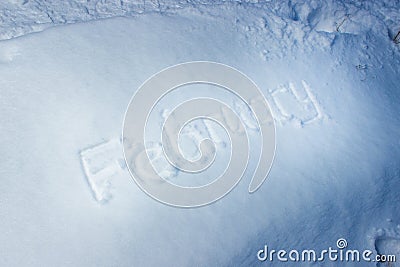 February handwritten on fresh snow Stock Photo