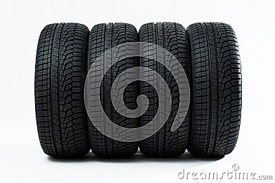 Winter tires with structured adhesion surface in line Stock Photo