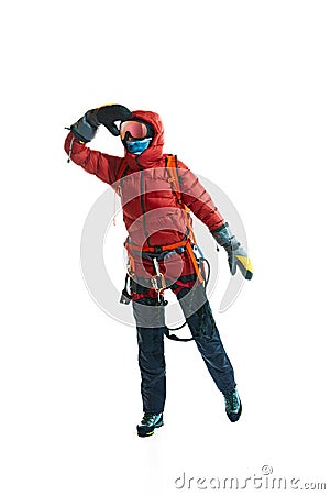 Winter tourism. Man wearing protective goggles, gloves, boots and special equipment for mountain climbing isolated on Stock Photo