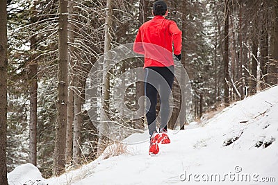 Winter trail running Stock Photo