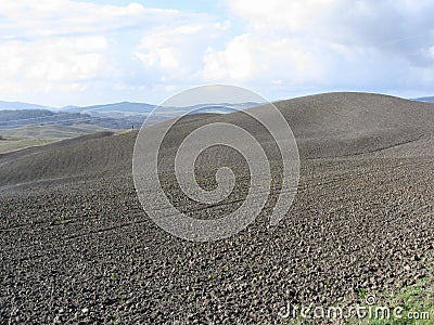 Winter Tuscany landscape with plowed fields at morning Stock Photo