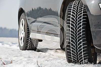 Winter tyres wheels installed on suv car outdoors Stock Photo