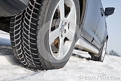 Winter tyres wheels installed on suv car outdoors Stock Photo