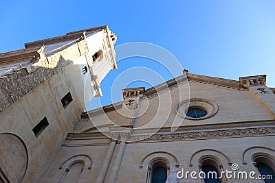 Winter view to the medieval Collegiate Basilica of Santa Maria of Xativa, Spain with blue sky on the background Stock Photo