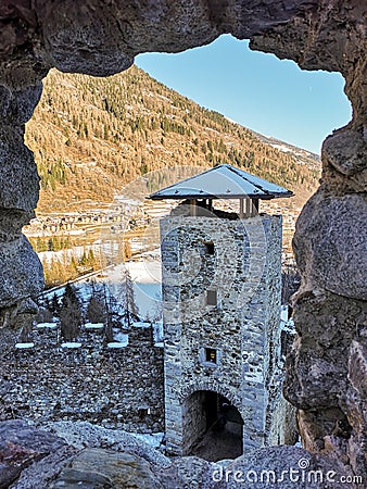 Winter view of the tower of the castle of San Michele which rises in the village of Ossana, Italy Stock Photo