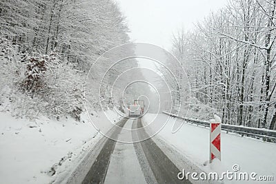 Winter weather, snow on the road. Snow calamity on the road. Stock Photo