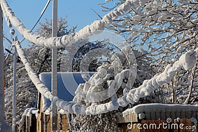 Winter wires. Snow-covered power grids Stock Photo