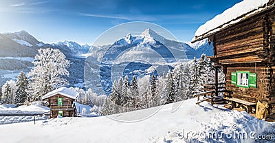 Winter wonderland with mountain chalets in the Alps Stock Photo