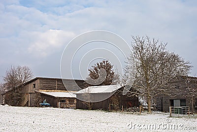 Winter Wonderland: Snow-Covered European Village Countryside. A Snow-Covered European Village in the Picturesque Stock Photo