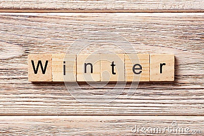 Winter word written on wood block. winter text on table, concept Stock Photo