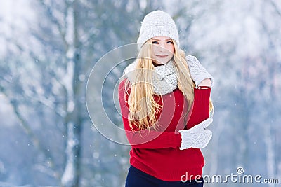 Winter young teen girl portrait. Beauty Joyful Model Girl laughing and having fun in winter park. Beautiful young woman Stock Photo