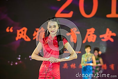 Wintersweet-Female cheongsam show Editorial Stock Photo