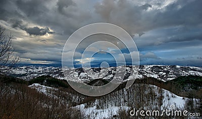Wintertime landscape featuring snowy mountain Stock Photo