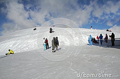 Wintertime: time to have fun in a ski resort. Snow, mountain, holiday, skiing. Editorial Stock Photo