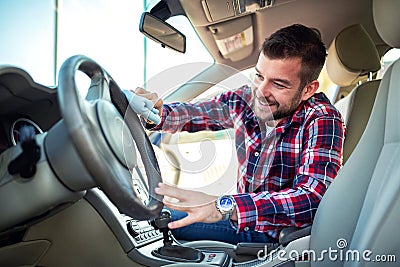 Wiping car windows with neatness Stock Photo