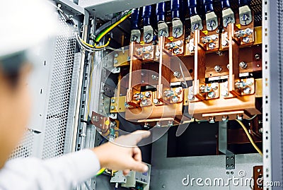 Wire cable assemble or connect with copper busbar in electrical power cabinet for supply electric high power to production line or Stock Photo