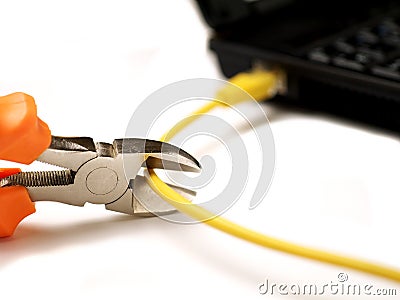 Wire cutter cutting network cable from laptop on white background Stock Photo