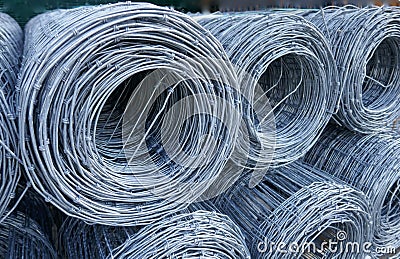 Wire mesh fence, rolled up. Close up, texture, background, Stock Photo