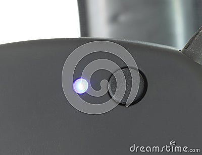 Wireless connection button on hearing protection Stock Photo