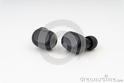 Wireless earbuds or earphones on white background Stock Photo