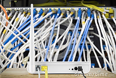 Wireless modem router with cable connecting on the local network Stock Photo