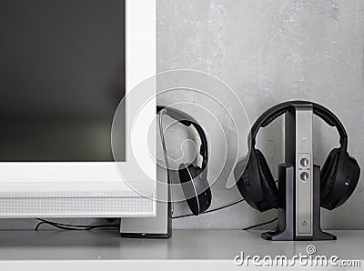 Wireless noise-canceling black headphones charging Stock Photo