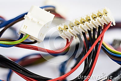 Wires and electrical connectors old parts on white background Stock Photo