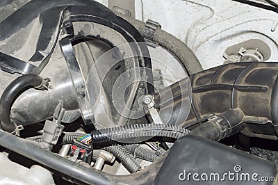 Wiring and ducts under the hood of the car Stock Photo