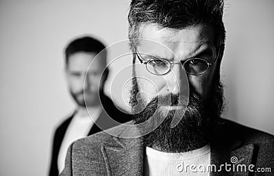 Wise glance. Hipster style and fashion. Hipster eyeglasses. Man handsome bearded hipster wear eyeglasses. Eye health and Stock Photo