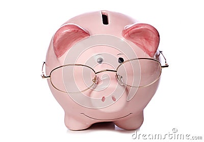 Wise money saving piggy bank cut out Stock Photo