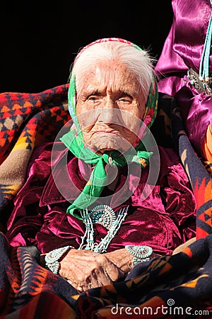 Wise Navajo Elder Wearing Traditional Jewelry Stock Photo