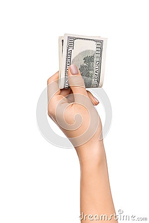 Wise savings. Female hand holding pile of dollars Stock Photo