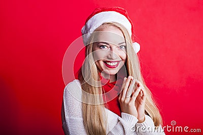 Wishful christmas lady with jellybag hat happily smiling Stock Photo