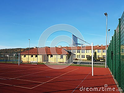 Wisniowa, Poland - 10 17, 2018: Modern basketball court in the courtyard of primary school. Multifunctional children`s playground Stock Photo