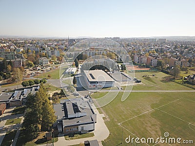 Wisniowa, Poland - 9 10 2018:Open school sports complex. Panorama of playing fields from a bird`s flight. Aerial photography from Editorial Stock Photo