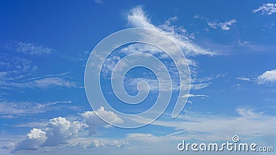 WIspy and cumulus clouds and blue sky for background use or sky substitution Stock Photo