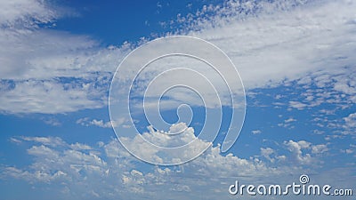 WIspy and cumulus clouds and blue sky for background use or sky substitution Stock Photo