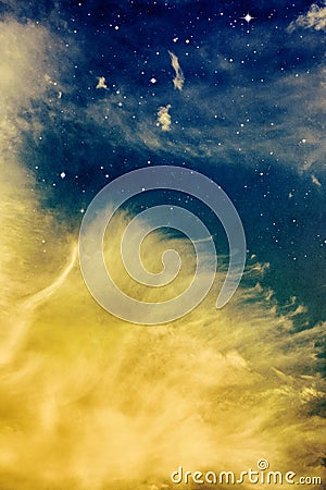 Wispy Yellow Clouds and Stars Stock Photo