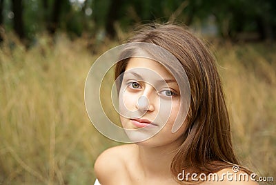Wistful young woman Stock Photo