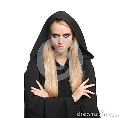 Witch in black mantle isolated on white. Scary fantasy character Stock Photo