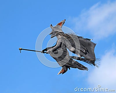 Witch on a broom Stock Photo