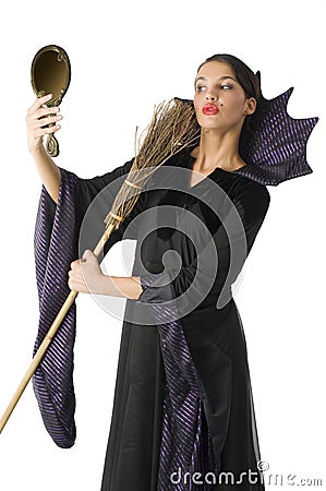 The witch with broom Stock Photo