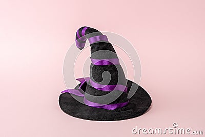 Witch hat on a pink background. Minimal Halloween spooky concept Stock Photo