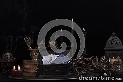 Witch laboratory with potion, elixirs, glass bottles, dry flowers, herbs and ingredients. Esoteric, wicca and occult Stock Photo